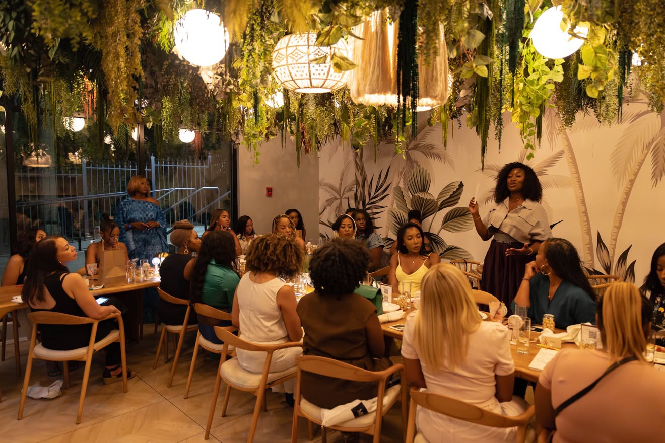 FWDHer members gathered at a salon dinner
